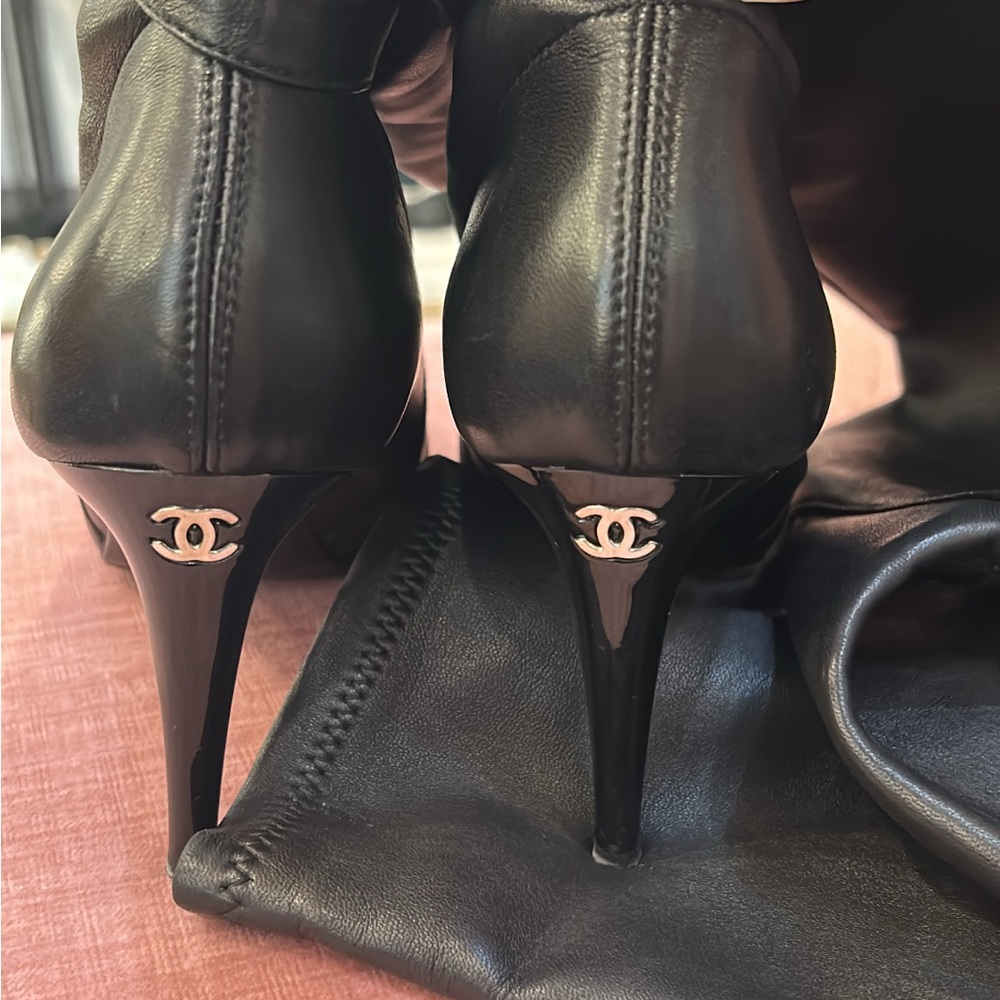 CHANEL Black Heeled Boots with Iconic Logo. Gently used